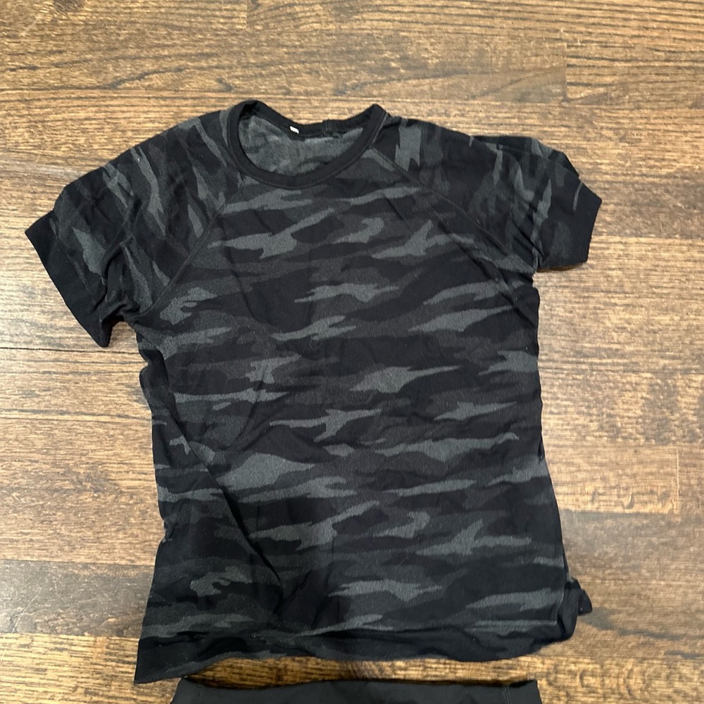 Athleta Girl outfit camouflage t-shirt and black shorts